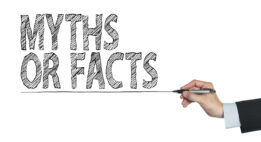 Person writing Myths or Facts on a whiteboard