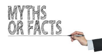 Person writing Myths or Facts on a whiteboard