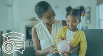 Mom holder her daughter showing her a piggy bank